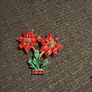 Elegant Floral Brooch with Red and Green Accents